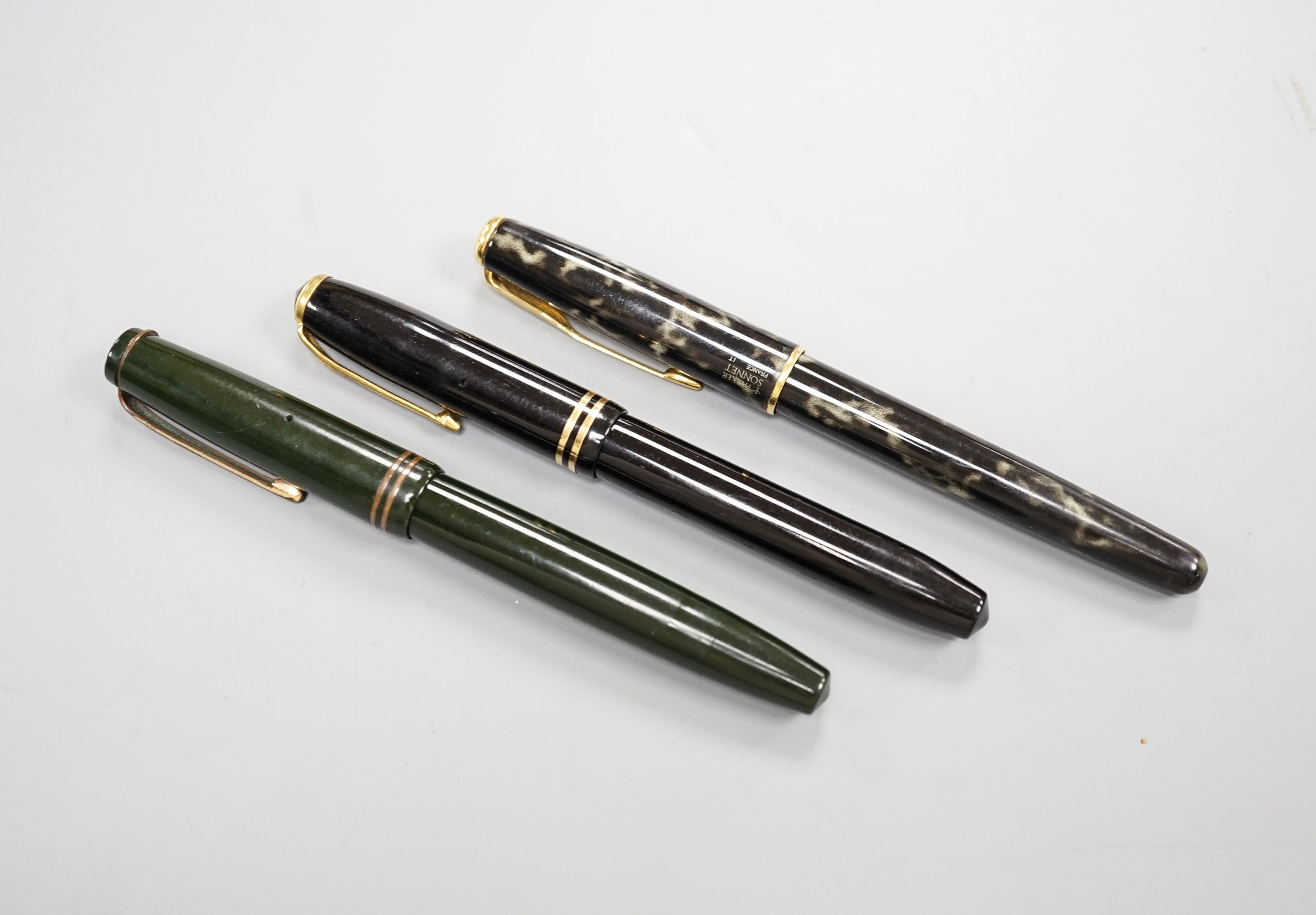 Three assorted fountain pens, to include, Conway Stewart, Parker Victory and Parker Sonnett with 18ct nib.